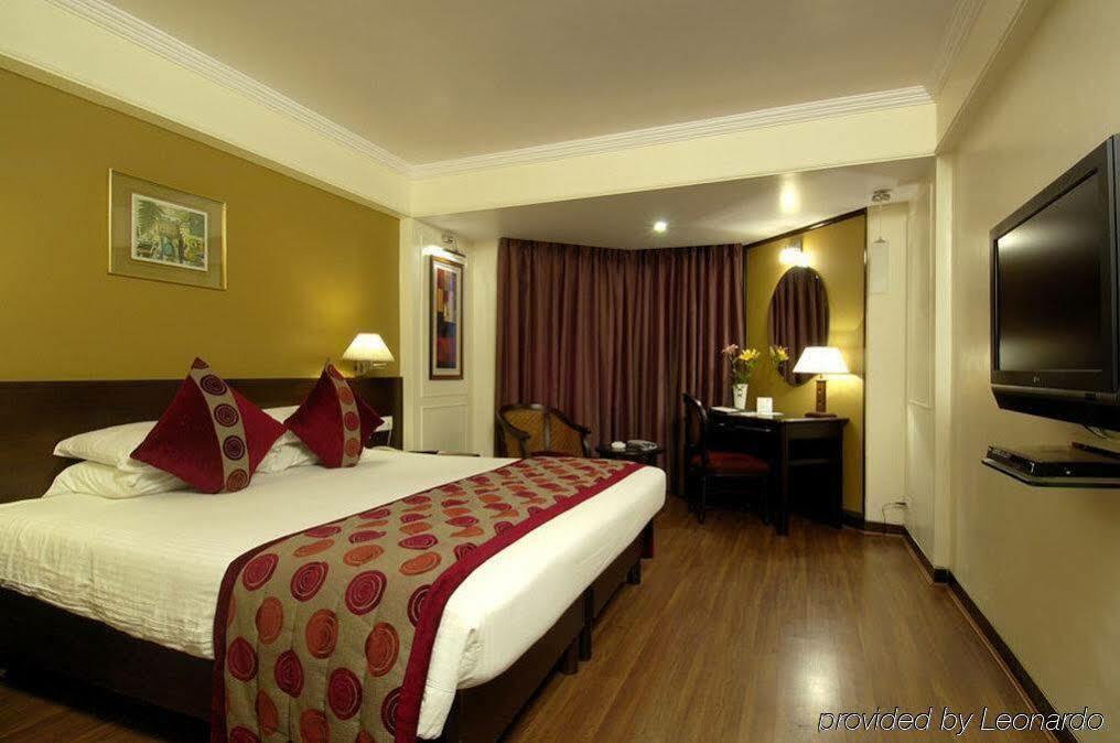 Ramee Guestline Hotel Juhu Bombaim Quarto foto
